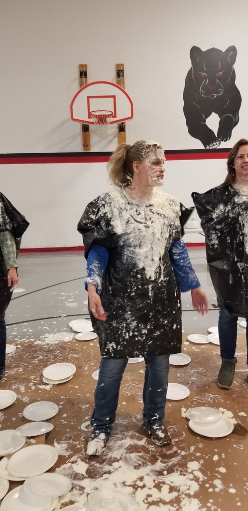 a woman covered in whipped cream