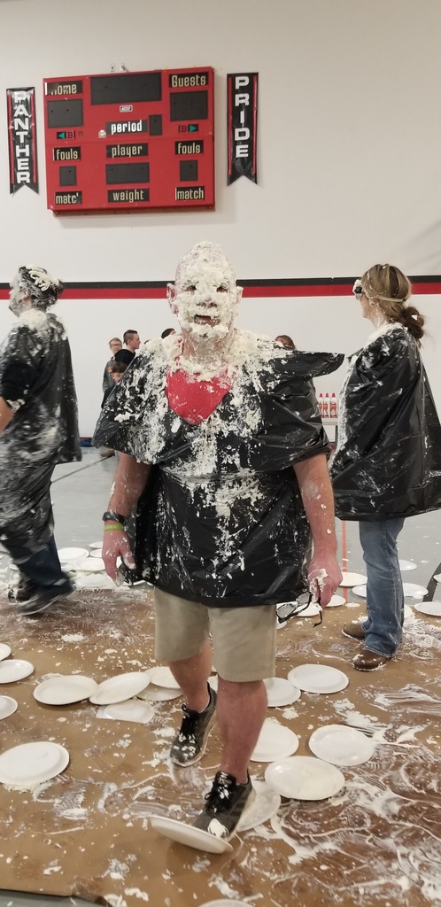 a man covered in whipped cream